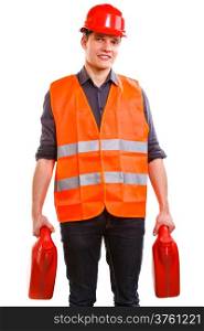 Young man construction worker in orange safety vest and red hard hat holding plastic canisters isolated on white. Industrial power and energy. Studio shot.