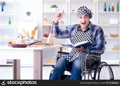 Young man cook with book of food recipes