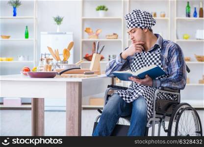 Young man cook with book of food recipes