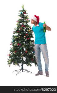 Young man decorating christmas tree isolated on white