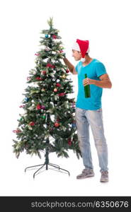 Young man decorating christmas tree isolated on white