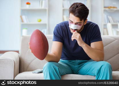 Young man defeated in sports game suffered loss with broken blee. Young man defeated in sports game suffered loss with broken bleeding nose