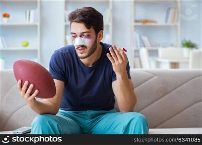Young man defeated in sports game suffered loss with broken blee. Young man defeated in sports game suffered loss with broken bleeding nose