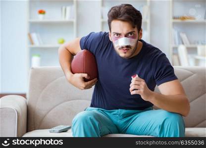 Young man defeated in sports game suffered loss with broken blee. Young man defeated in sports game suffered loss with broken bleeding nose