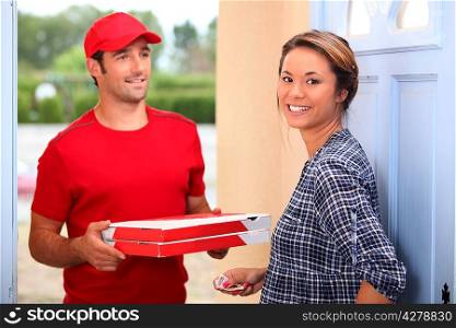 young man delivering pizza