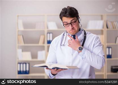 Young man doctor in medical concept
