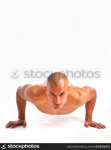 young man doing a pushup