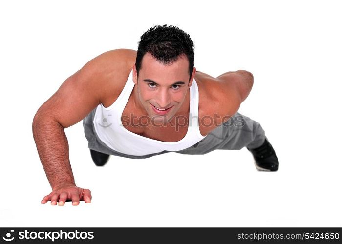 Young man doing push-ups
