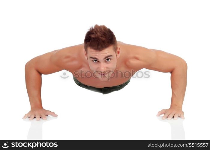 Young man doing pushups isolated on a white background