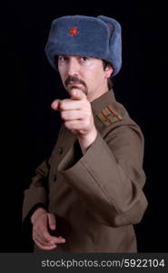 young man dressed as russian military, studio