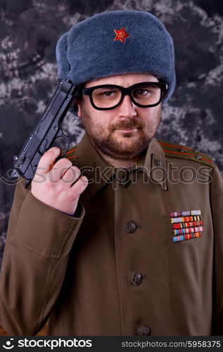 young man dressed as russian military, studio