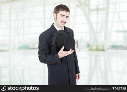 young man dressed as vintage businessman at the office