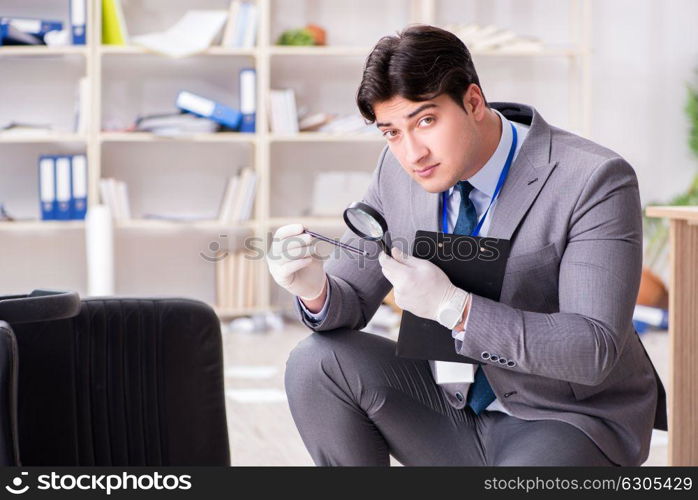 Young man during crime investigation in office