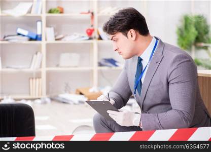 Young man during crime investigation in office