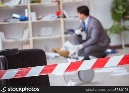 Young man during crime investigation in office