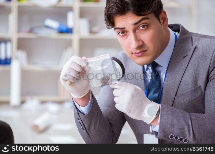 Young man during crime investigation in office