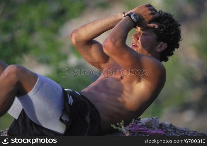 Young man exercising outdoors