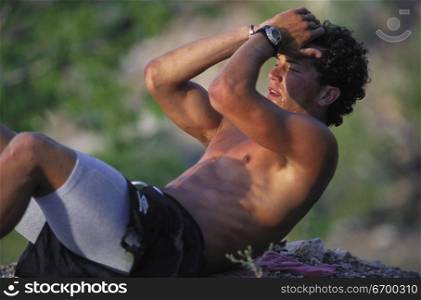 Young man exercising outdoors