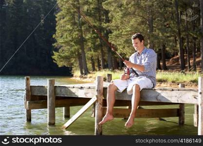 Young man fishing