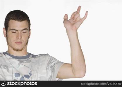 Young man gesturing