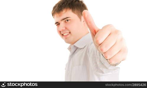 Young man gesturing success symbol. Isolated om white.