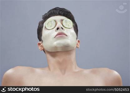 Young man getting a facial
