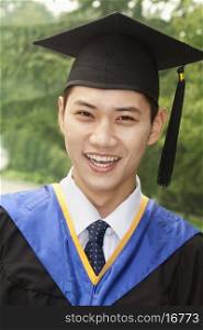 Young Man Graduating From University, Close-Up Portrait