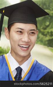 Young Man Graduating From University, Close-Up Portrait