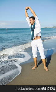 young man have good time and relax at beautifu beach at seaside