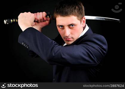 Young man hold sword