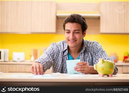 Young man husband in budget planning concept
