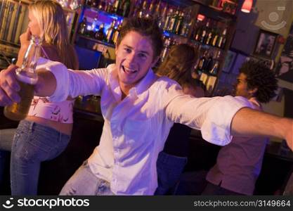 Young man in a bar