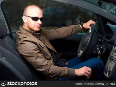 young man in a car