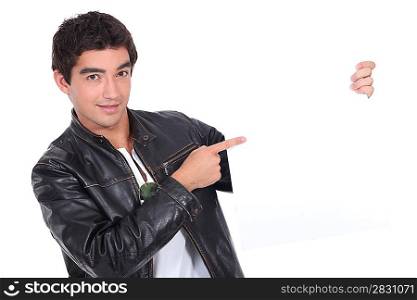 Young man in a leather jacket