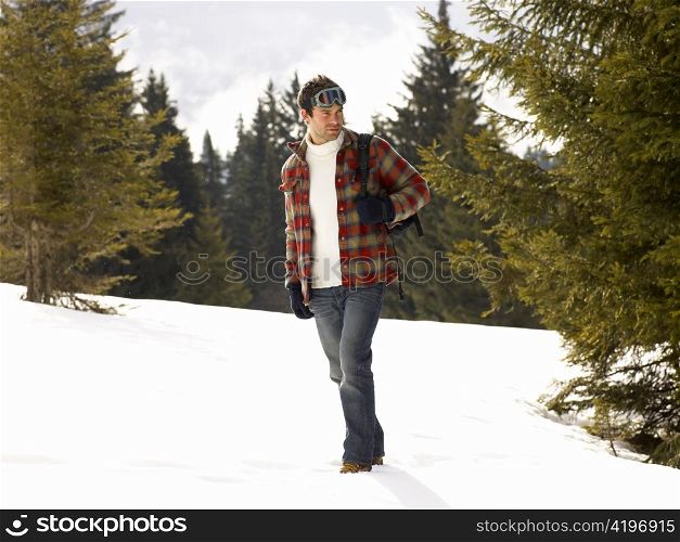 Young Man In Alpine Snow Scene