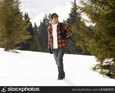 Young Man In Alpine Snow Scene