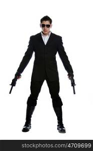 Young man in black suit holding gun isolated on white background