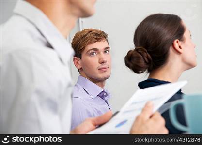 Young man in business meeting