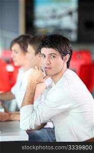 Young man in business training