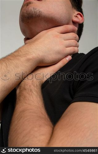 young man in depression. a young man with black tshirt siting down in depression