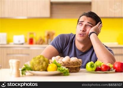 Young man in dieting and healthy eating concept