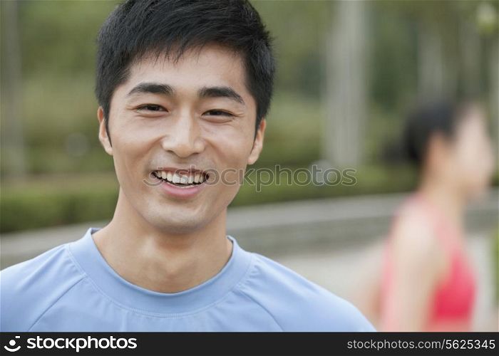 Young Man in exercise clothing in a Park, Beijing, China