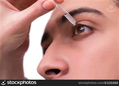 Young man in eye care medical concept