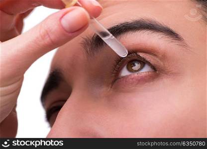 Young man in eye care medical concept