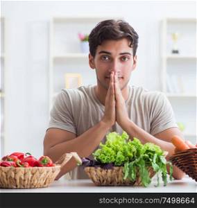 Young man in healthy eating and dieting concept. The young man in healthy eating and dieting concept