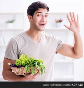 Young man in healthy eating and dieting concept. The young man in healthy eating and dieting concept