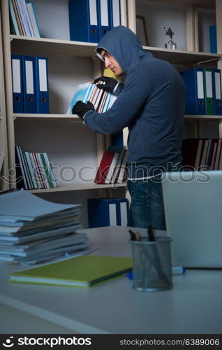 Young man in industrial espionage concept