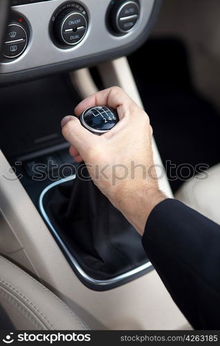 Young man in luxury sports car