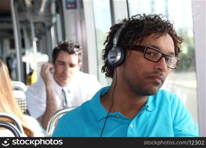 young man in public transportation