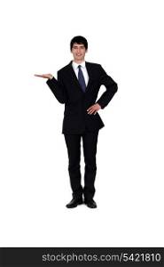 Young man in smart suit on white background